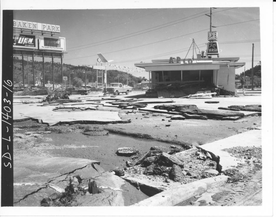 South edge of Baken Park parking lot pavement destroyed